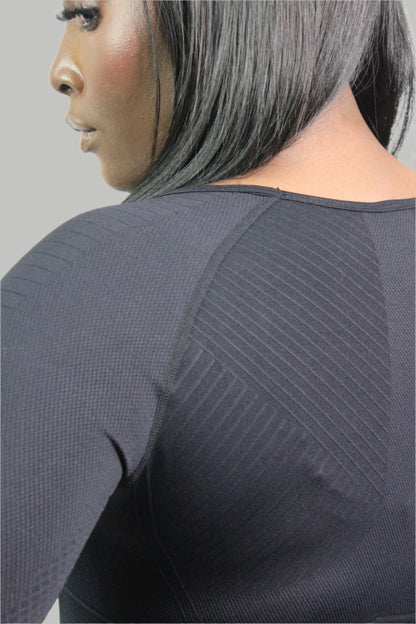 Black Valkyrie long sleeve shirt by Titans, showcasing a fitted design with stylish detailing on the fabric.