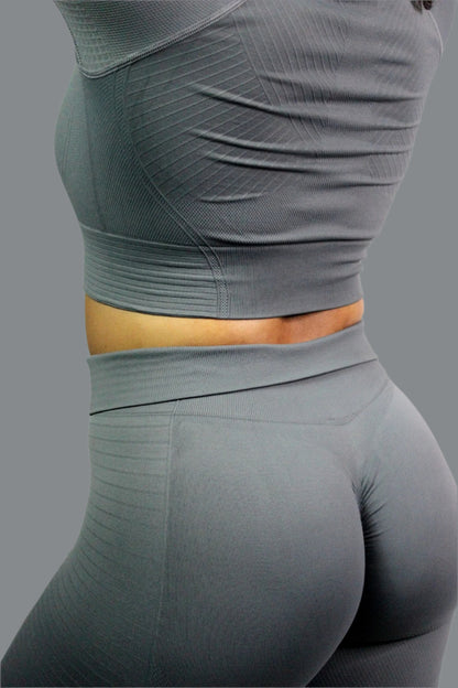 Grey Valkyrie leggings by Titans, close-up of stretchy fabric and detailed design on a mannequin.