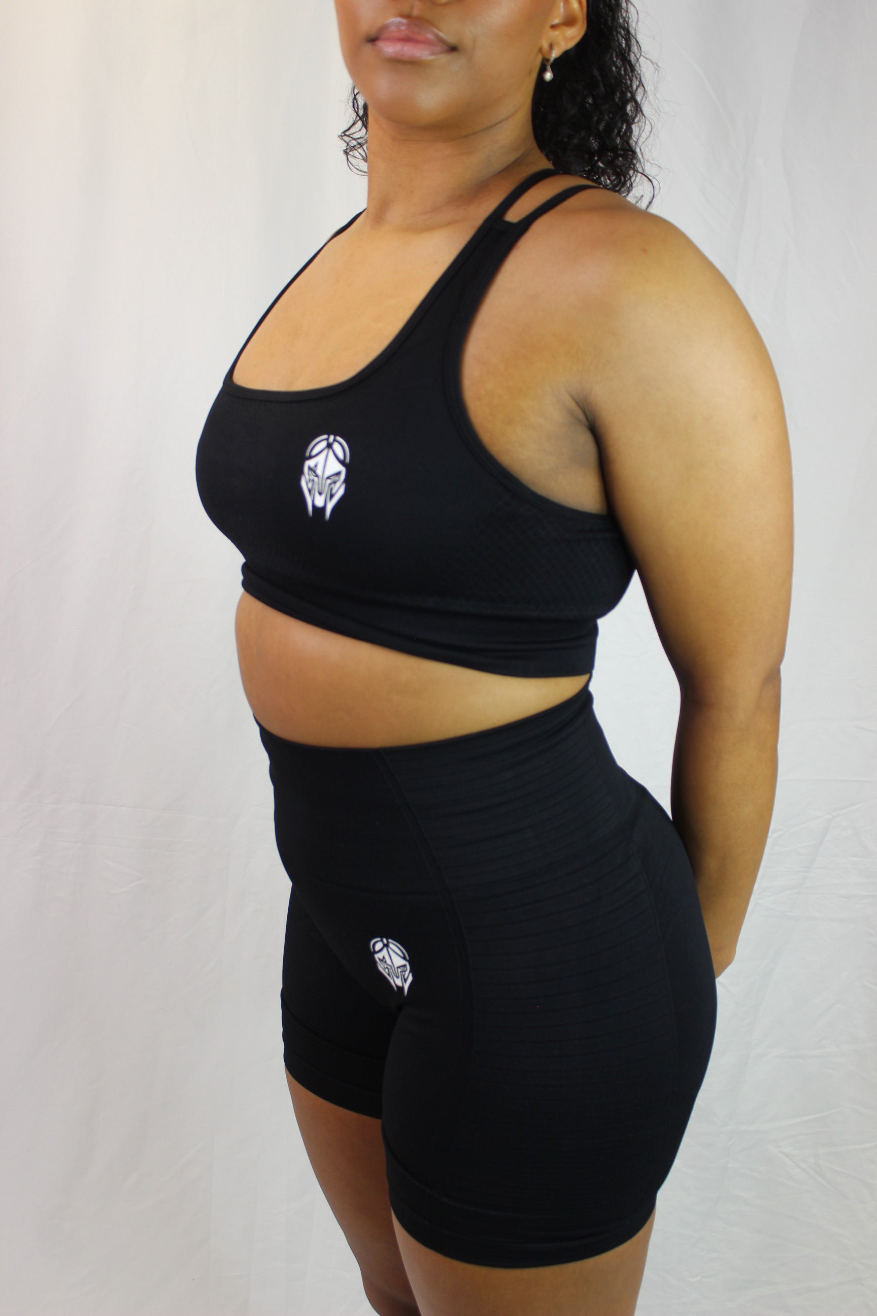 Black Valkyrie Shorts by Titans, featuring a comfortable fit and stylish design, shown on a model in this product image.